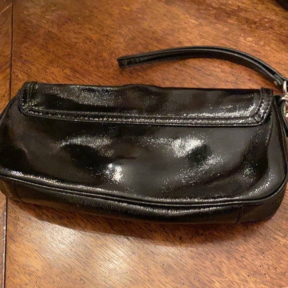 Michael by Michael Kors EUC clutch with wrist strap.. patent leather .